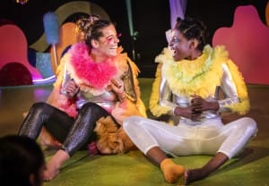 Take Flight actresses smiling at each other